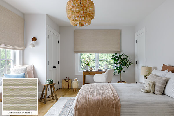 Soft weaves found in these Waterfall Woven Shades in a boho-inspired bedroom are one of the window treatment trends of 2026