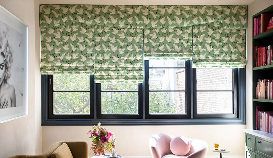 Privacy shades in a Flat Roman Shade style made of Family of Cranes in Waverly Green has blackout lining for the best privacy as a room-darkening window treatment