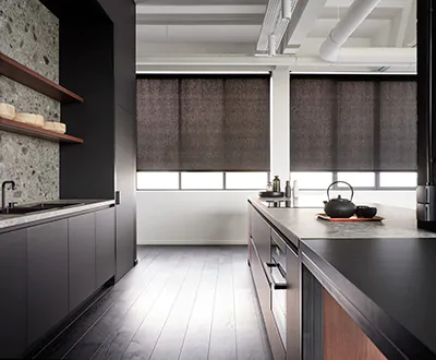 Modern window shades using roller shades for a kitchen with a dark color scheme include sleek black solar shades with 3% openness